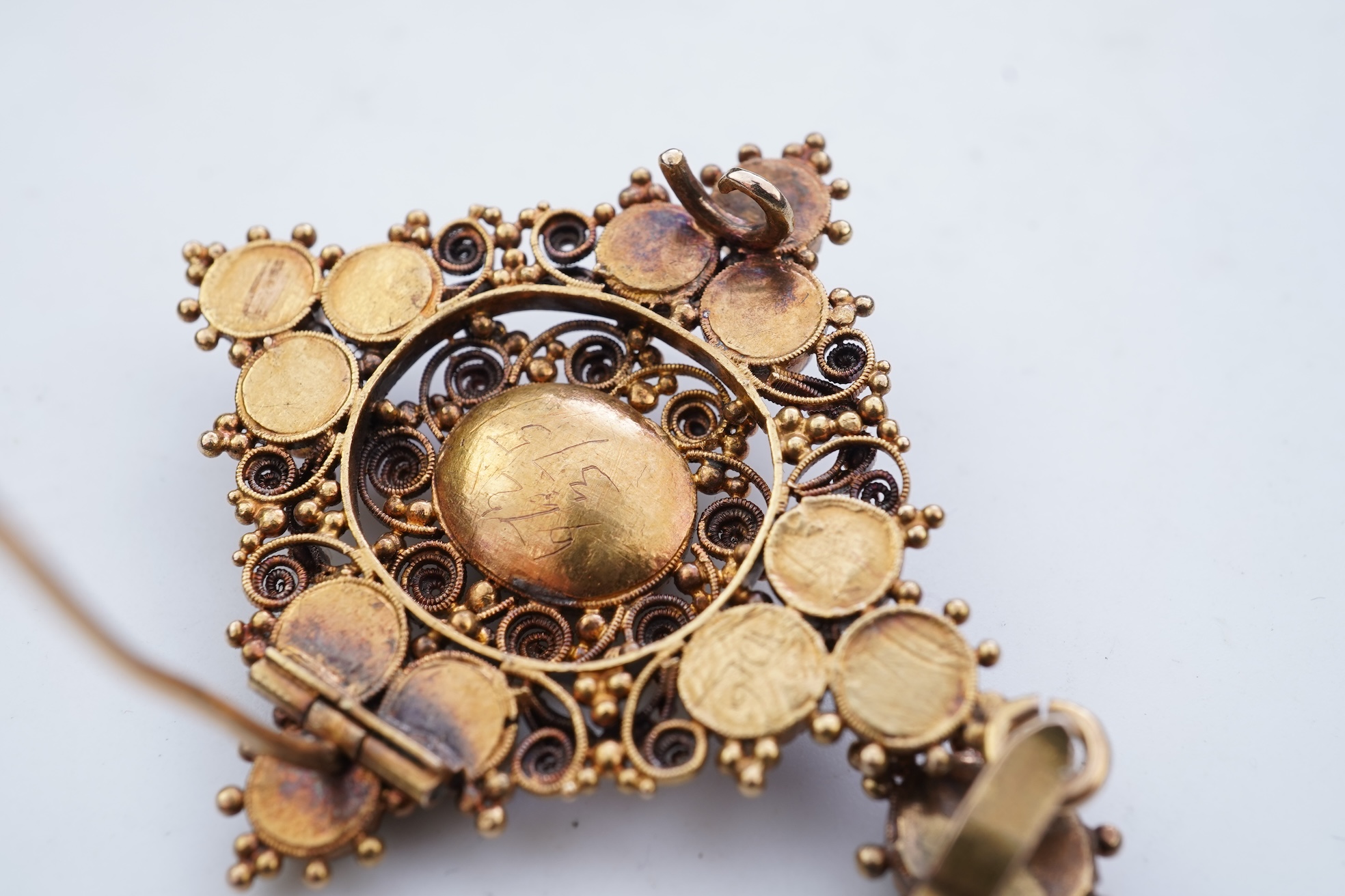 A late Georgian garnet pendant/brooch, 1830s